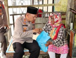 Kapolres Pelabuhan Belawan Beri Bantuan Sembako untuk Warga Terdampak Banjir Rob