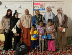 Bawa Kebahagiaan, HMI Bagi Sanck ke Anak Pengungsi di Aceh Tengah